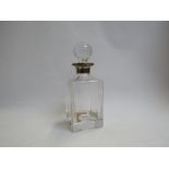 A square form decanter with silver collar,