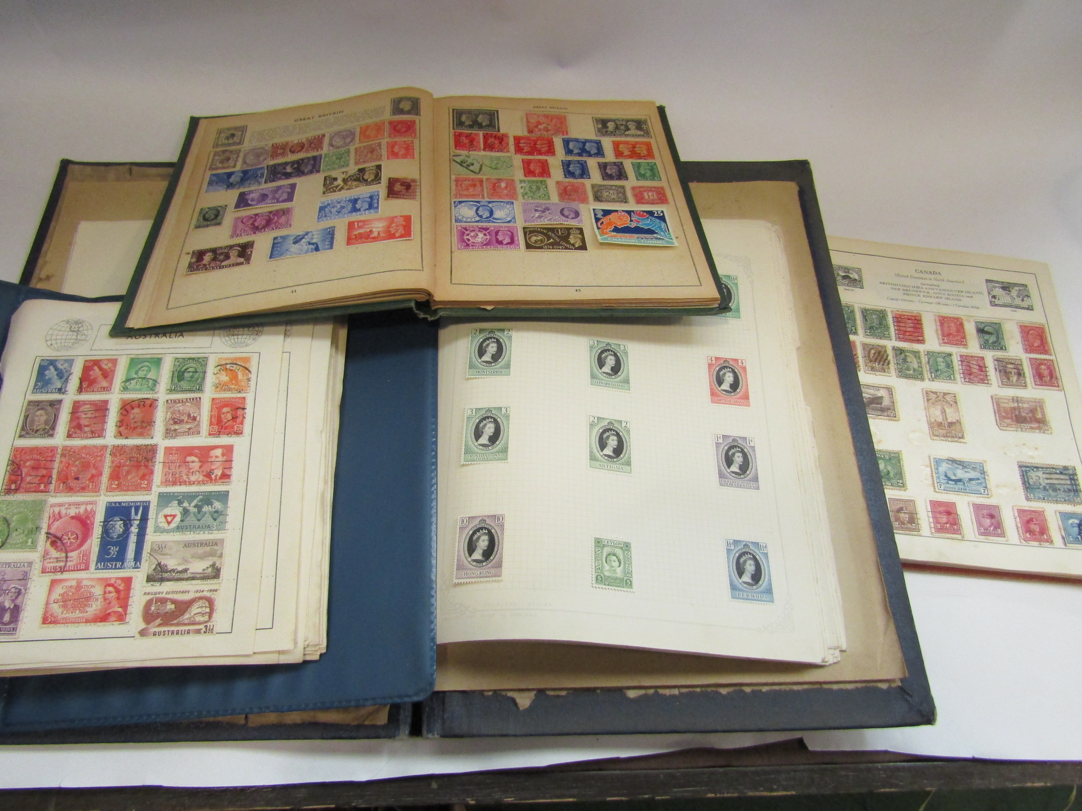 Four stamp albums,