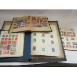 Four stamp albums,