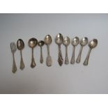 A variety of silver and Sterling spoons and a fork,