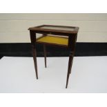 A 20th Century bijouterie cabinet on square tapering legs,