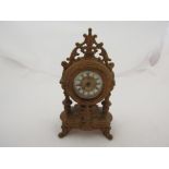 A miniature French ormolu timepiece,