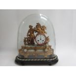 A 19th Century French onyx and ormolu figural clock under glass dome,