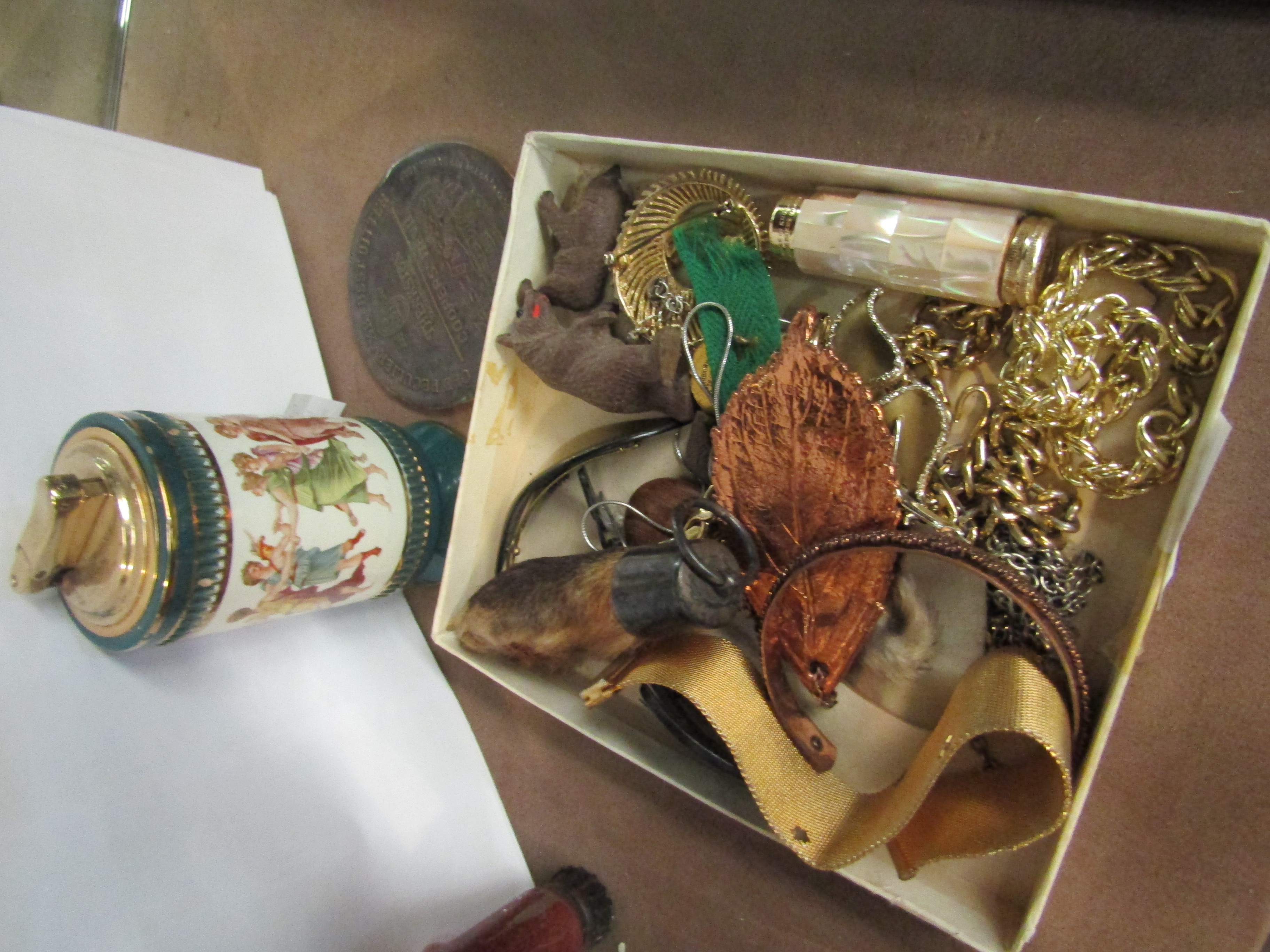 A box of miscellaneous collectables including Colibri Italian table lighter and costume jewellery