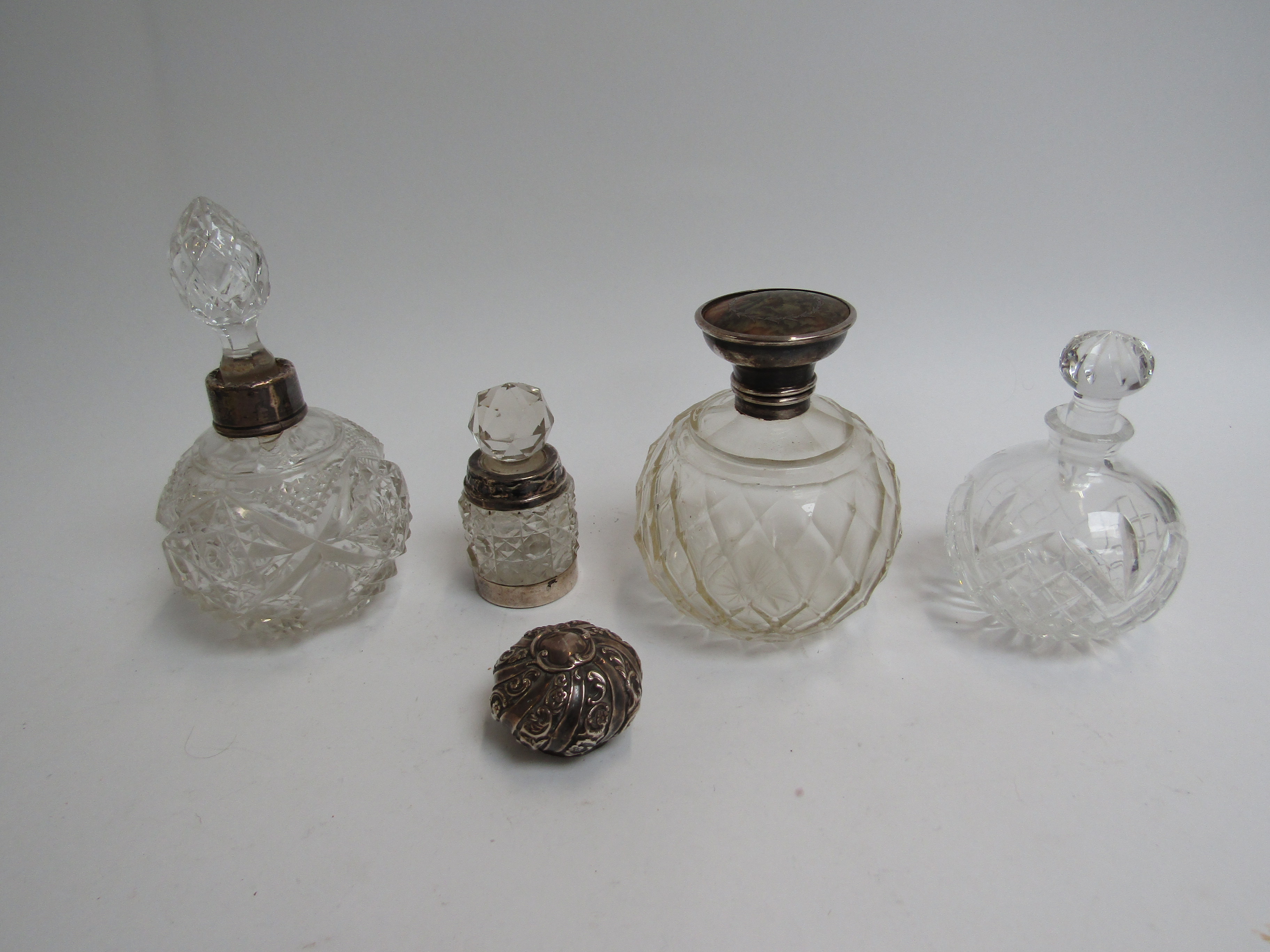Crystal glass scent bottle some with silver embellishment (4)