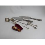 Mixed silver cutlery etc including cake servers, sugar nips, pipe, sugar sifting spoon,