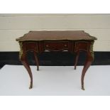 A 20th Century French Kingwood lady's dressing table/desk, back leg restored,