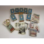 A box of Ardath cigarette cards, etc many full sets including "Life in the Services",