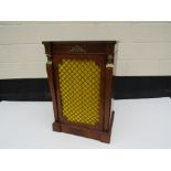 A 20th Century French Kingwood cabinet with lattice grill to door, mask pillars, 82.