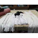A box containing mainly Edwardian christening robes, some with broderie anglaise,