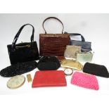 A selection of handbags and purses from the 1950s and 1960s including gold leather and silver