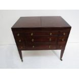 A George III Hepplewhite flame mahogany gentleman's dressing chest.