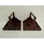 A pair of mahogany and brass bound library book carriers or night trays with central carrying