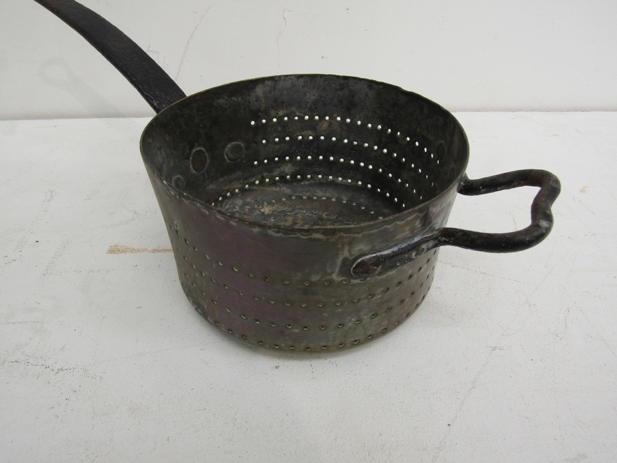 Kitchenalia: A collection including a Georgian copper saucepan colander, an oval copper press, - Image 2 of 5