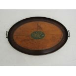 A large 19th century mahogany oval galleried serving tray with brass handles,