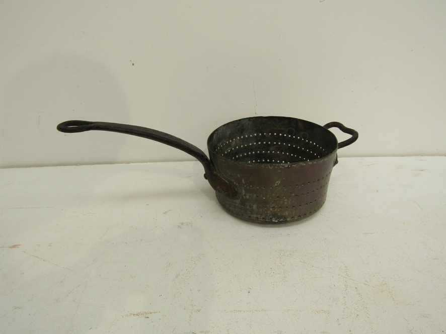 Kitchenalia: A collection including a Georgian copper saucepan colander, an oval copper press, - Image 3 of 5