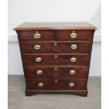 A late Georgian tall mahogany split chest of two short,