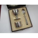 A cased silver three piece christening set, monogrammed,