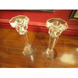 A pair of crystal glass candlesticks,