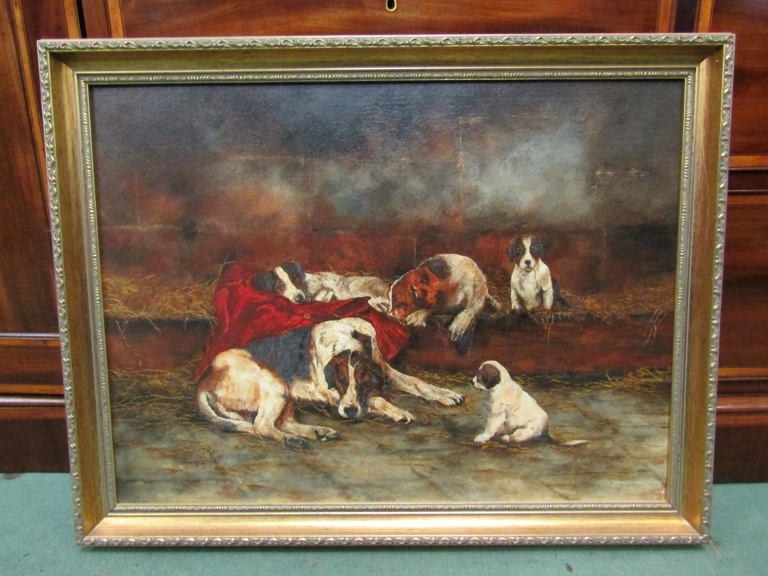 STEPHEN CLARK: A gilt framed oil on board of dogs and puppies in barn, signed lower right,