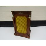 A 20th Century French kingwood cabinet with lattice grille to door, mask pillars, 82.