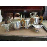 A five piece Piquot Ware tea and coffee set