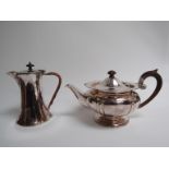 An Art Nouveau silver plate teapot and an Arts & Crafts coffee pot (2)