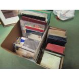 A box containing assorted stamps, first day covers,