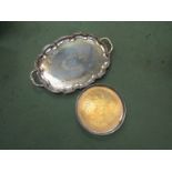 A silver plate twin handled tray and circular tray (2)