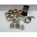 A set of six silver napkin rings,