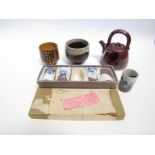 A collection of ceramics including small Japanese style teapot, impressed mark, two yunomi,
