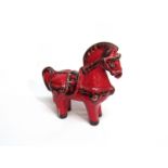 An Italian 1950's red glaze ceramic horse in the Bitossi style,