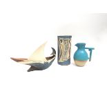 An Ebenianaky Pottery vase, ceramic boat and jug by Marie Hamer.