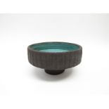 CLIVE BROOKER (1934-2005) A studio pottery textured pedestal bowl with blue glazed interior.