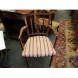 A pair of Georgian style elbow chairs