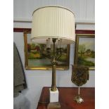 A pair of marble and gilt classical design table lamps with four arms and pleated shades