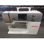 A Bernina sewing machine (screen glass a/f) with embroidery plate,