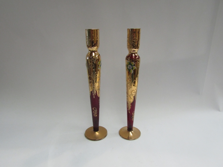 A pair of Venetian glass candlesticks,