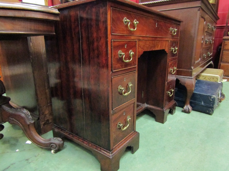 An 18th Century and later mahogany kneehole desk, eight drawers and recessed door, - Image 3 of 3