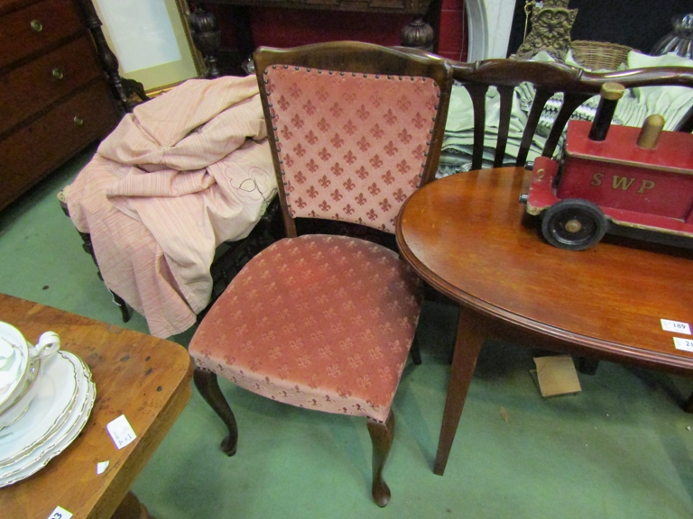 A pair of Victorian mahogany shaped back side chairs