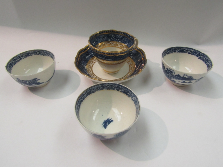 Three Caughley porcelain tea bowls and a Caughley cup and saucer