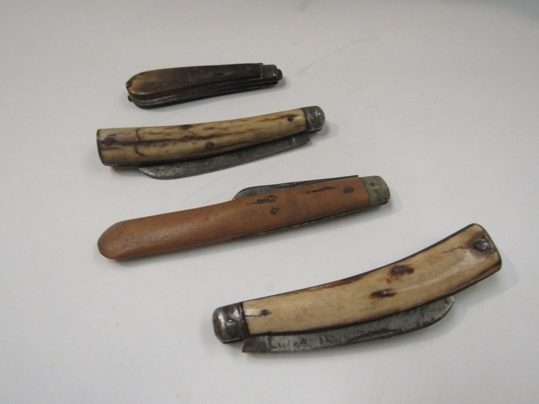 Four Victorian bone handled pen knives