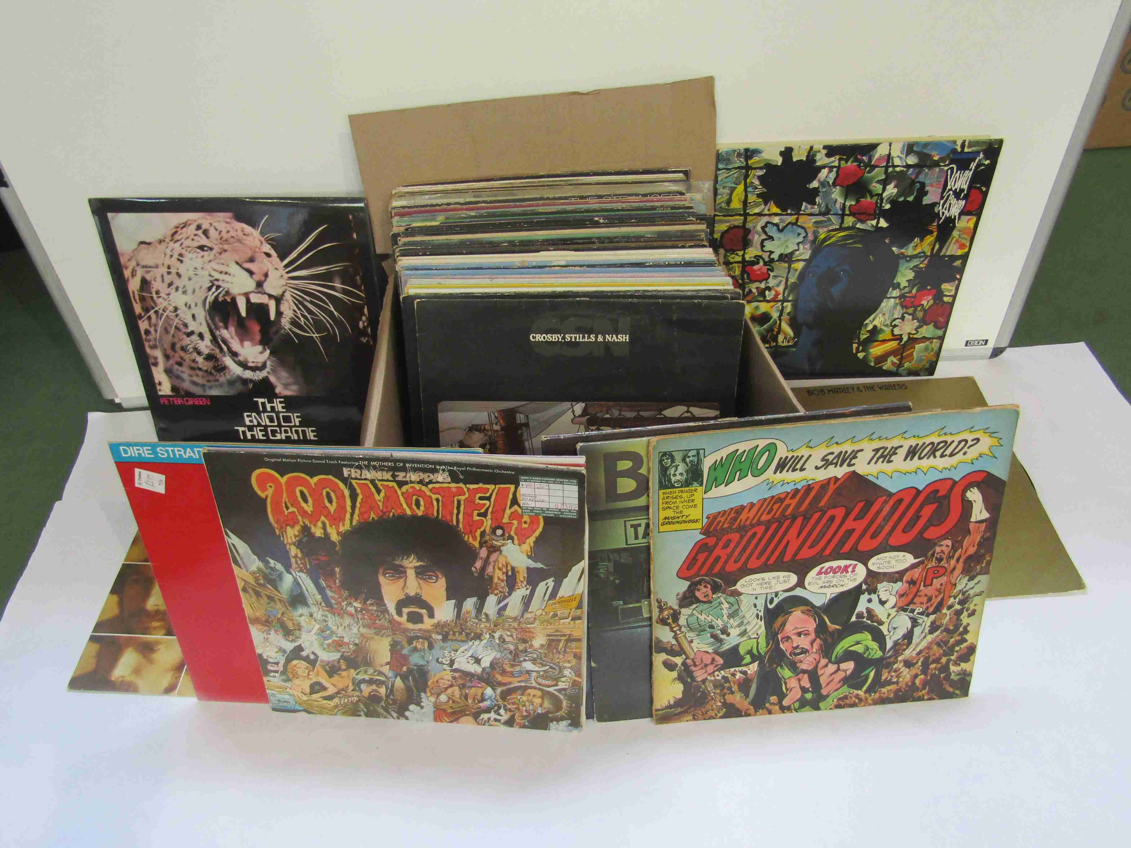 A box of mixed LPs including Frank Zappa, BB King, Peter Green, Dire Straits, Focus, Dave Edmunds,