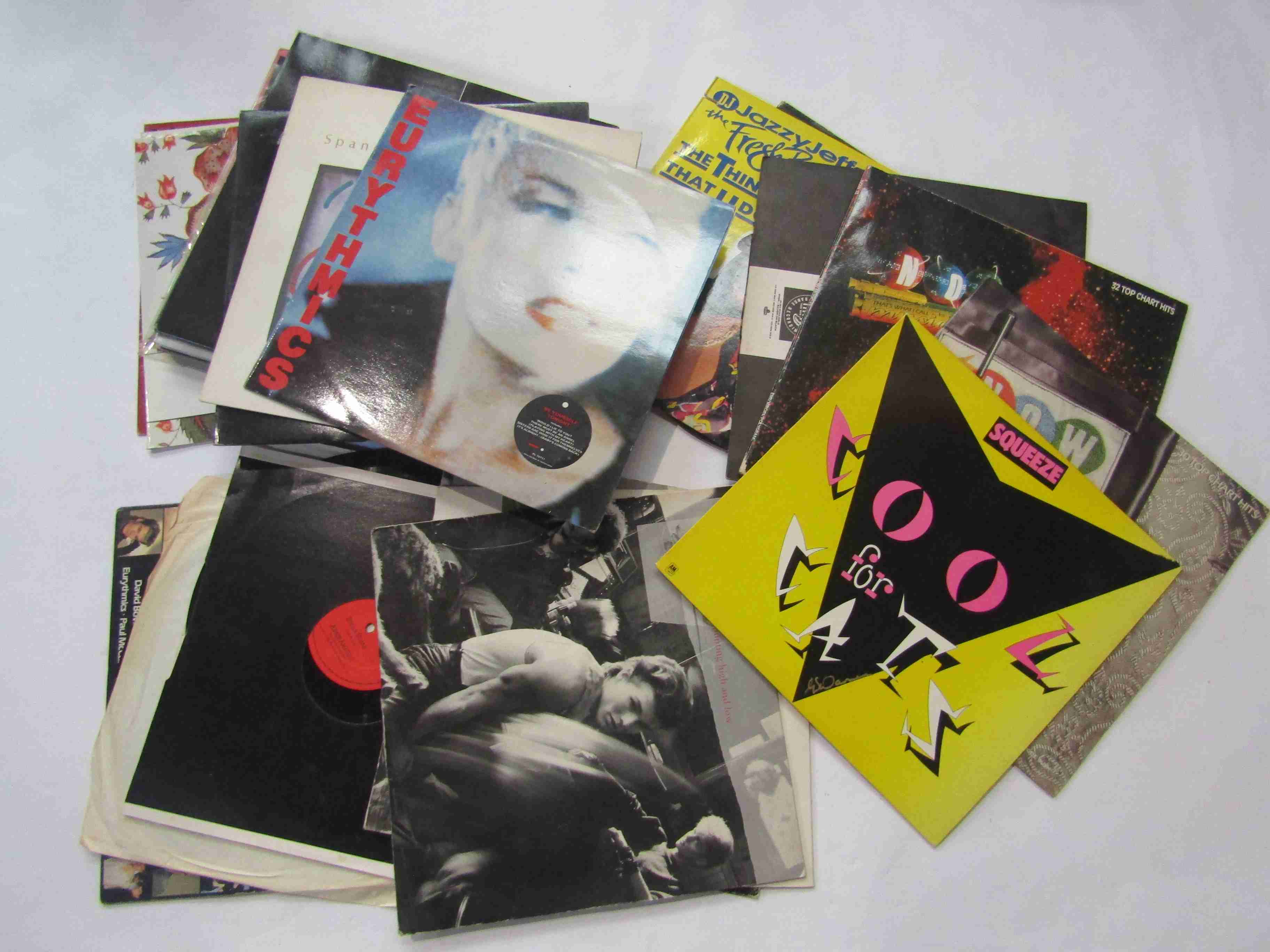 A collection of mostly 1980s LPs and 12" singles including 'Now' compilations, Eurythmics, UB40,