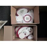 Two boxes containing a quantity of Wedgwood "Mayfield" dinner wares