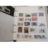 A box containing assorted Worldwide stamps