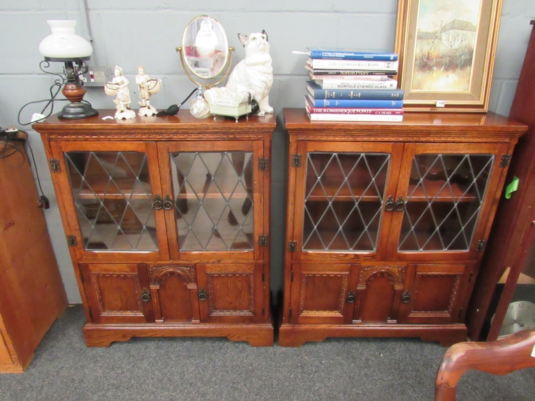 A pair of late 20th Century old charm style lead glazed cabinets,