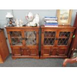 A pair of late 20th Century old charm style lead glazed cabinets,