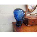 A blue glass head