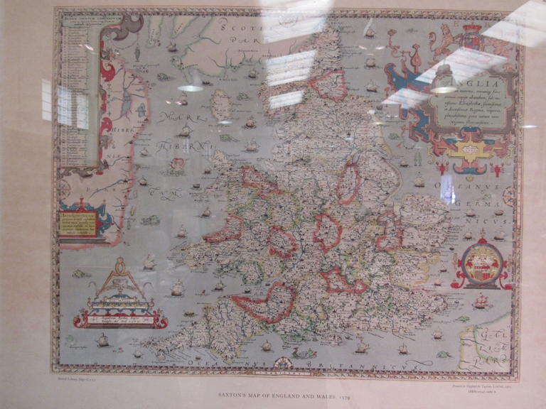 A reproduction of Saxton's 1579 Map of England & Wales, framed and glazed,